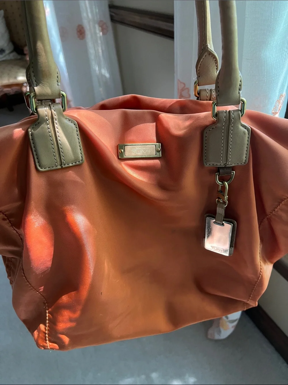 Tumi Orange Nylon Tote with Tan Leather Handles. Pre owned.